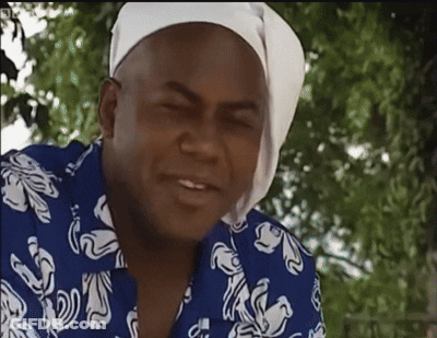 Man In Blue And White Shirt With Head Scarf GIF