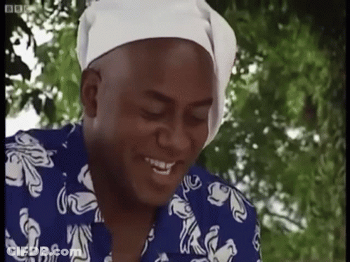 Man In Blue And White Shirt With Headband Smiling GIF