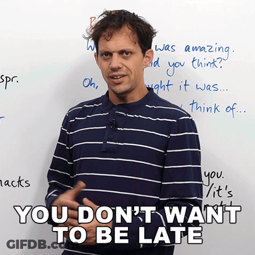 Man In Blue And White Striped Shirt Says You Don't Want To Be Late GIF