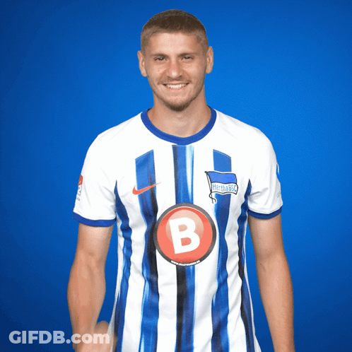 Man In Blue And White Striped Shirt With Letter B GIF