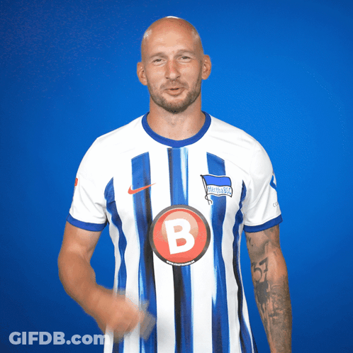 Man In Blue And White Striped Shirt With Letter B GIF