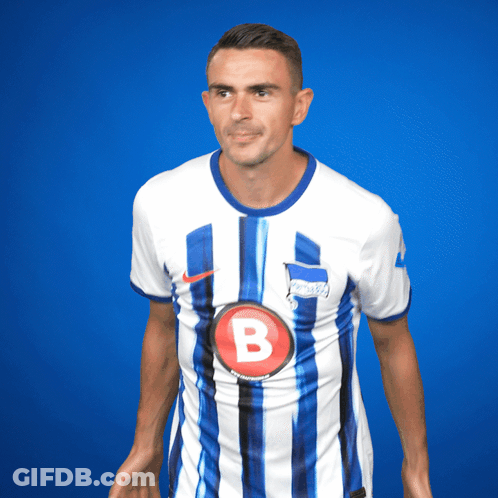 Man In Blue And White Striped Shirt With Letter B GIF