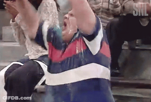 Man In Blue And White Striped Shirt With SNL GIF
