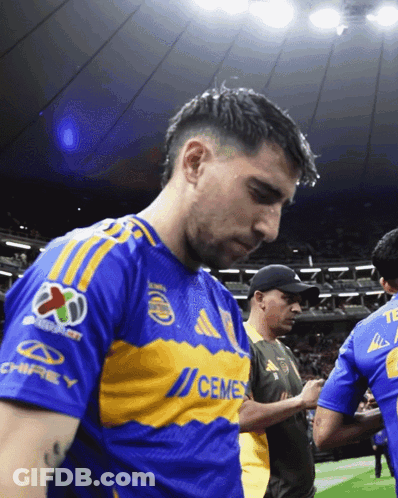 Man In Blue And Yellow Cemex Jersey GIF