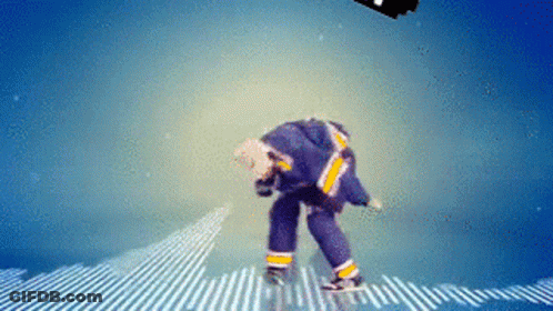 Man In Blue And Yellow Hockey Uniform GIF