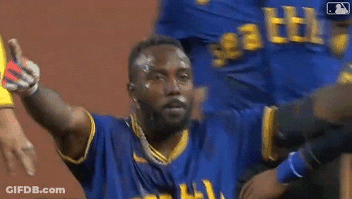 Man In Blue And Yellow Jersey On Baseball Field GIF