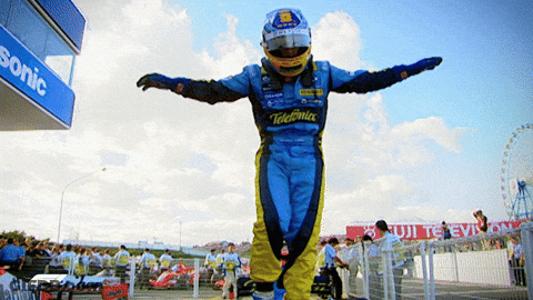 Man In Blue And Yellow Racing Suit With Telebnica GIF