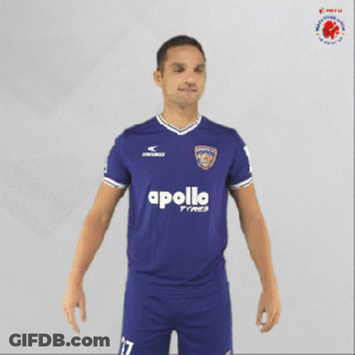 Man In Blue Apollo Tires Jersey Holding Soccer Ball GIF