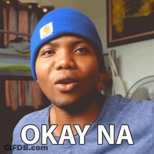 Man In Blue Beanie Saying Okay Na GIF