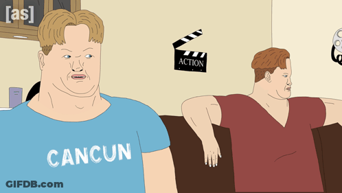 Man In Blue Cancun Shirt Sitting GIF