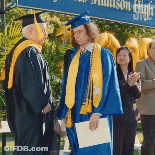 Man In Blue Cap And Gown GIF