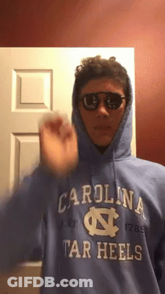 Man In Blue Carolina Tar Heels Hoodie And Sunglasses GIF