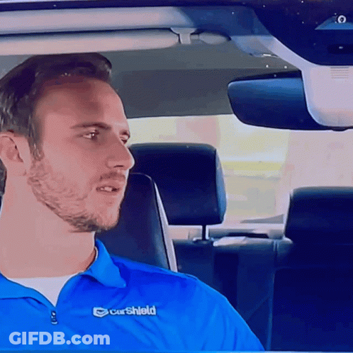 Man In Blue Carshield Shirt GIF