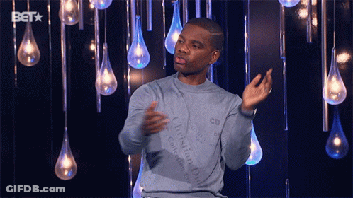 Man In Blue Christian Dior Sweater In Front Of Lights GIF