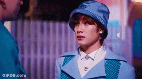 Man In Blue Coat And Woman In Blue Hat GIF
