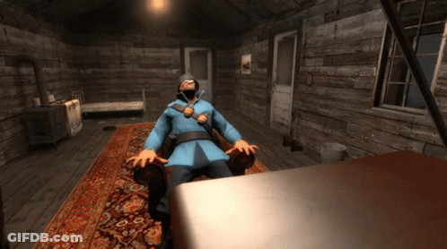 Man In Blue Coat Sitting In Chair GIF