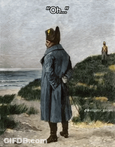 Man In Blue Coat Standing On Beach Saying Oh GIF