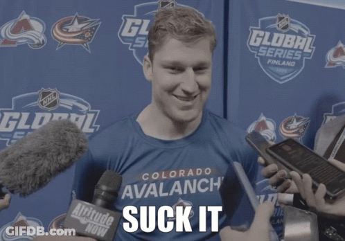 Man In Blue Colorado Avalanche Shirt Being Interviewed GIF