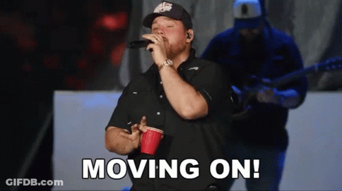 Man In Blue Columbia Shirt On Boat GIF