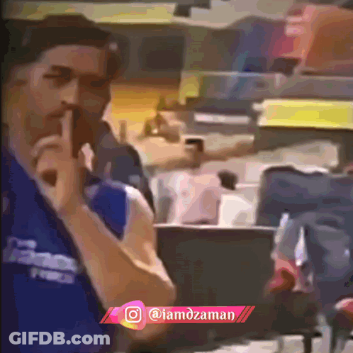 Man In Blue Dodgers Shirt Shushing GIF