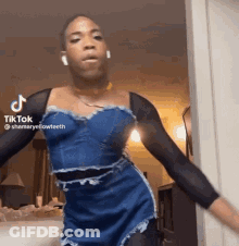Man In Blue Dress Dancing GIF