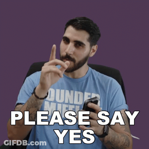 Man In Blue Dundee Mifflin Shirt Holding Cell Phone Saying Please Say Yes GIF
