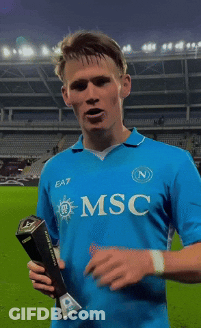 Man In Blue EA7 Shirt Holding Trophy GIF
