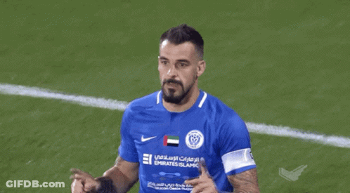 Man In Blue Emirates Islamic Jersey GIF