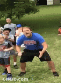 Man In Blue Georgia Shirt Dancing On Grass GIF