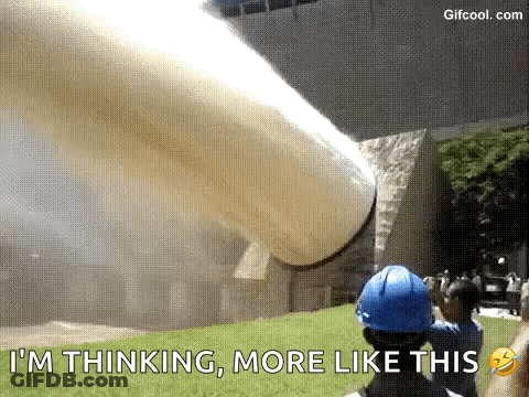 Man In Blue Hard Hat Standing By Pipe GIF