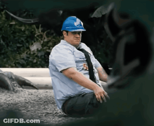 Man In Blue Hard Hat With R Badge GIF