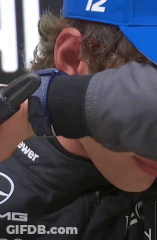 Man In Blue Hat And Black Shirt AMG GIF