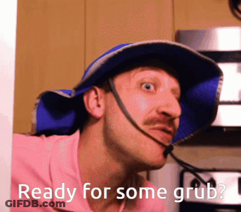 Man In Blue Hat And Pink Shirt Ready For Some Grub GIF