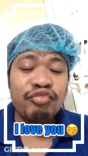 Man In Blue Hat And Shirt Saying I Love You GIF