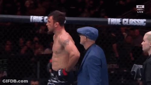 Man In Blue Hat Next To Boxer In Ring GIF