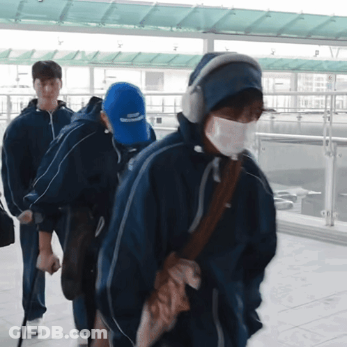 Man In Blue Hat Saying Keep Moving GIF