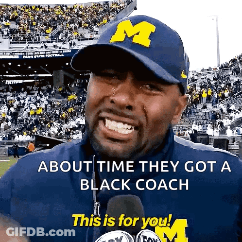 Man In Blue Hat With Letter M Says About Time They Got A Black Coach This Is For You GIF