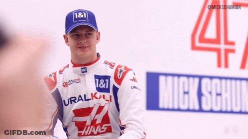 Man In Blue Hat With Number 1 & 1 GIF