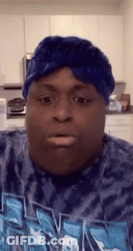 Man In Blue Headband And Tie Dye Shirt GIF