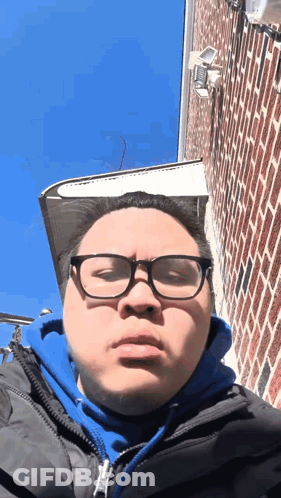 Man In Blue Hoodie And Glasses GIF