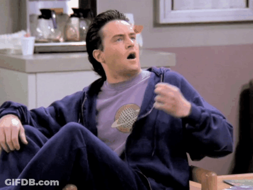 Man In Blue Hoodie And Purple Shirt With Planet GIF