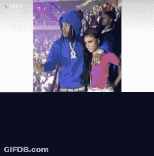 Man In Blue Hoodie And Woman In Pink GIF