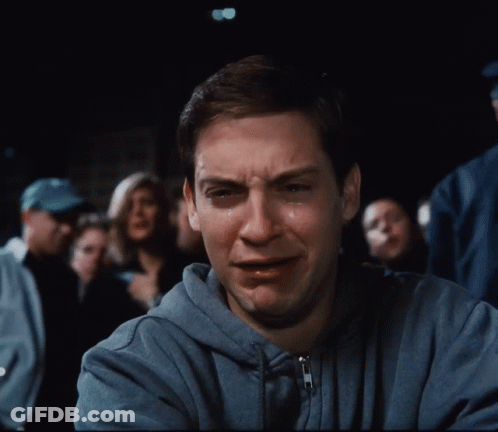 Man In Blue Hoodie Crying Before Crowd GIF