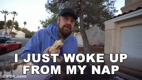 Man In Blue Hoodie Eating Sandwich Saying I Just Woke Up From My Nap GIF