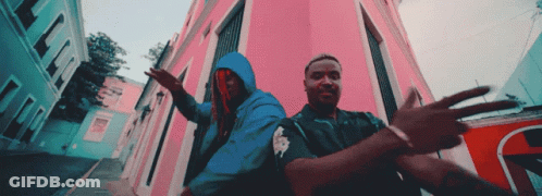 Man In Blue Hoodie Next To Man GIF