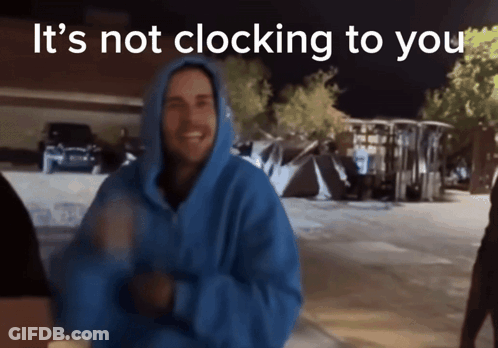 Man In Blue Hoodie Standing Before Sign GIF