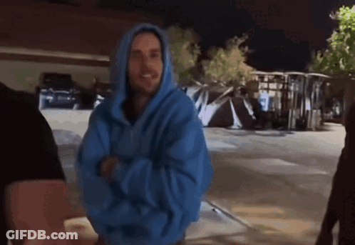 Man In Blue Hoodie Standing GIF