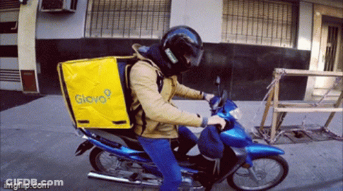 Man In Blue Hoodie With Adidas Logo And Headphones GIF