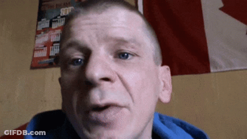 Man In Blue Hoodie With Canadian Flag GIF