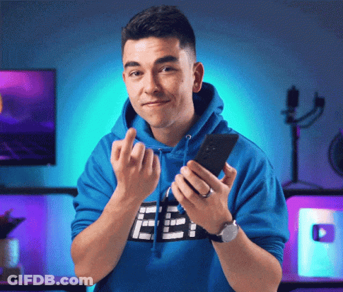 Man In Blue Hoodie With F Holding Phone GIF